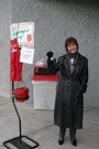 Bev Christy, Assistant District Governor/ Past-president, merrily ringing the bell @ Shopko in Sugar House on a cold, cloudy day.